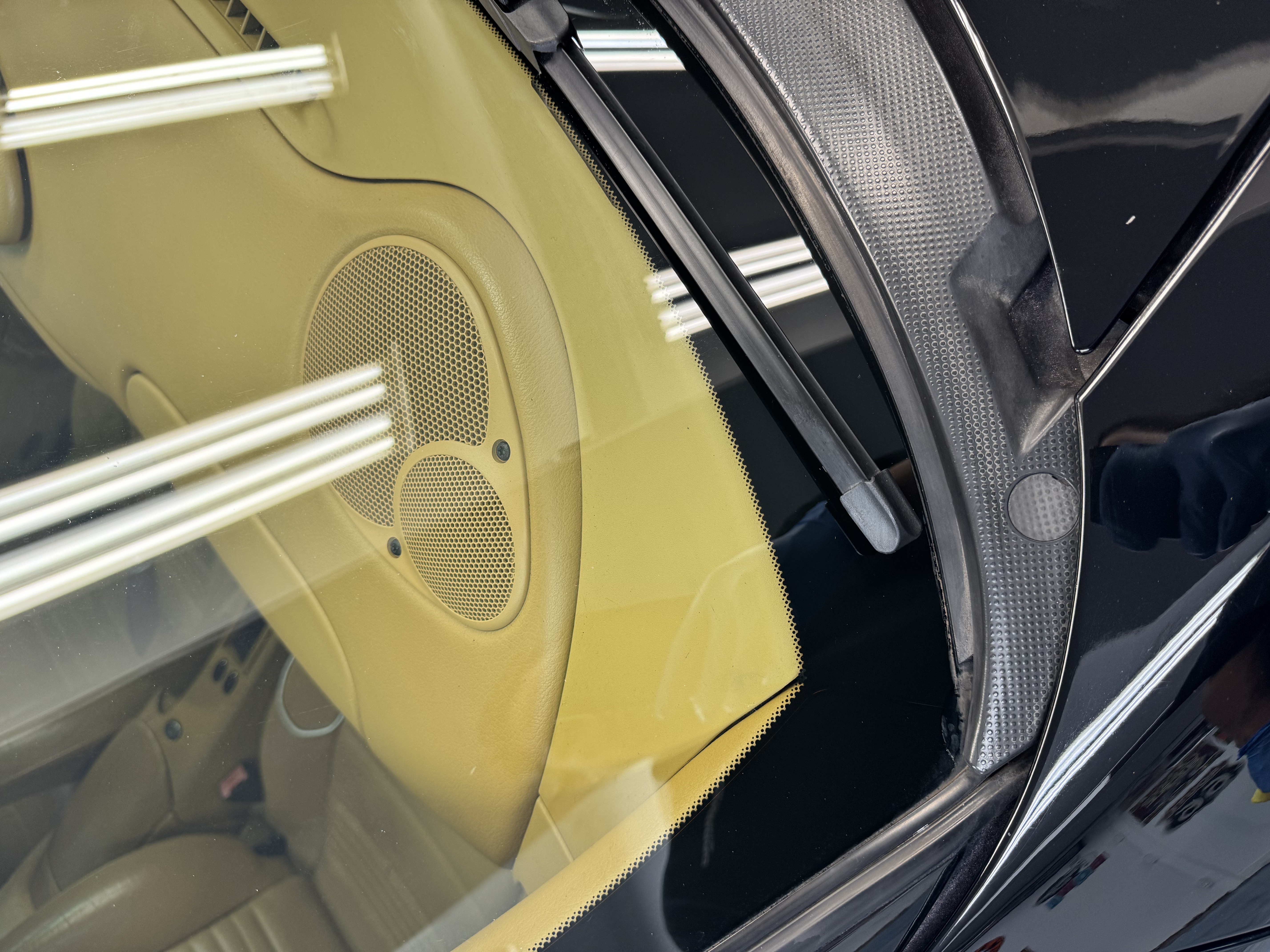 Porsche 911 side glass after — clean optical clarity