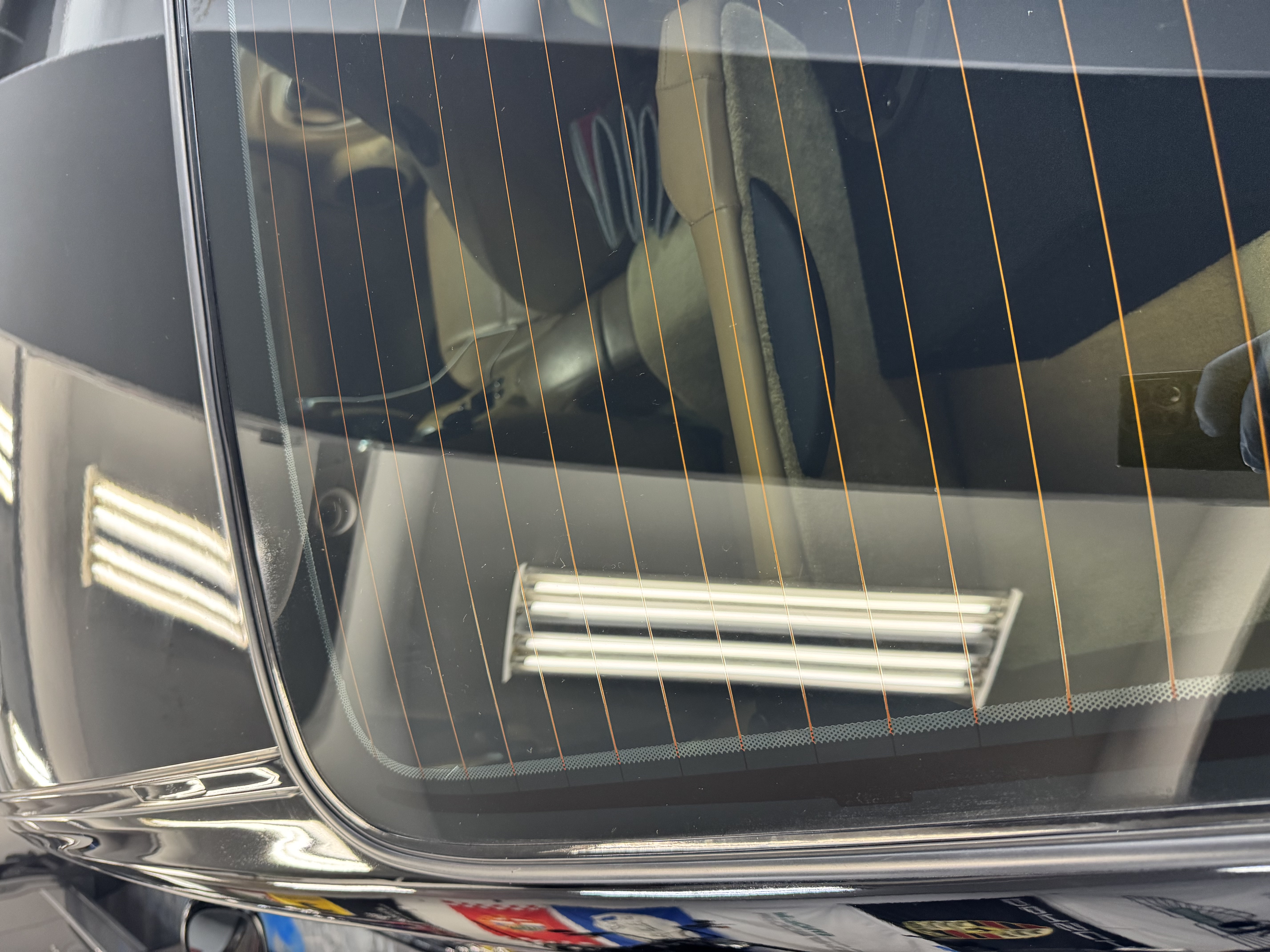 Porsche 911 rear glass after — clear and clean